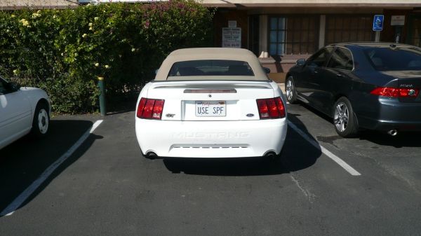 USE SPF plates on a covertible outside of a skincare clinic, San Diego, CA.JPG
